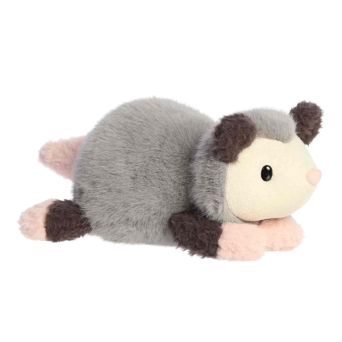 Plush Opossum toy on a white background