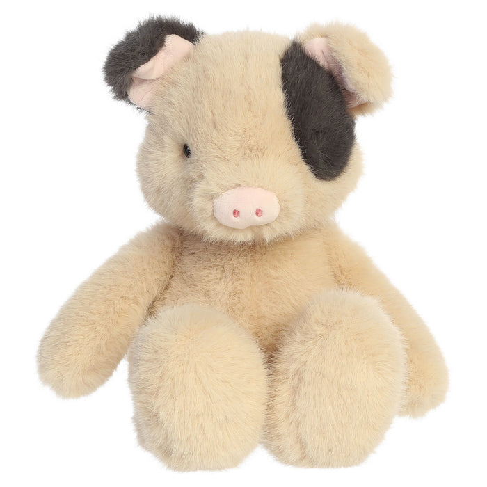 Plush toy pig on a white background