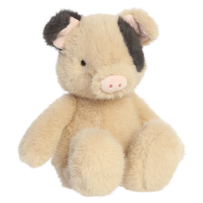 Plush toy pig on a white background