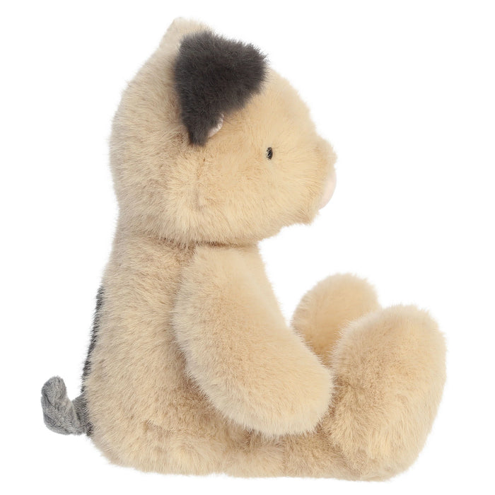 Plush toy pig on a white background