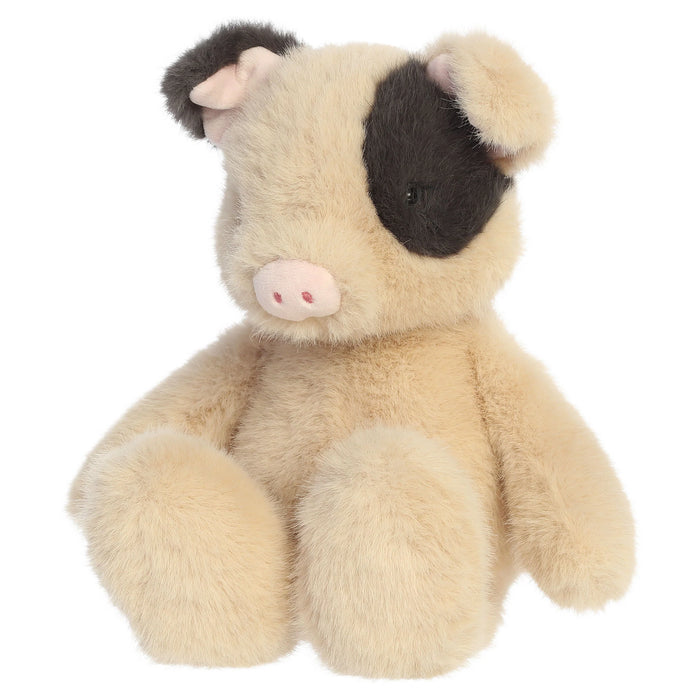 Plush toy pig on a white background