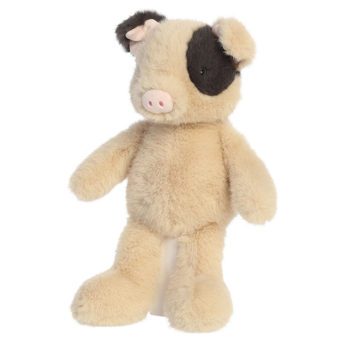 Plush toy pig on a white background