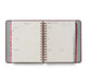 Open planner with colorful design on a white background
