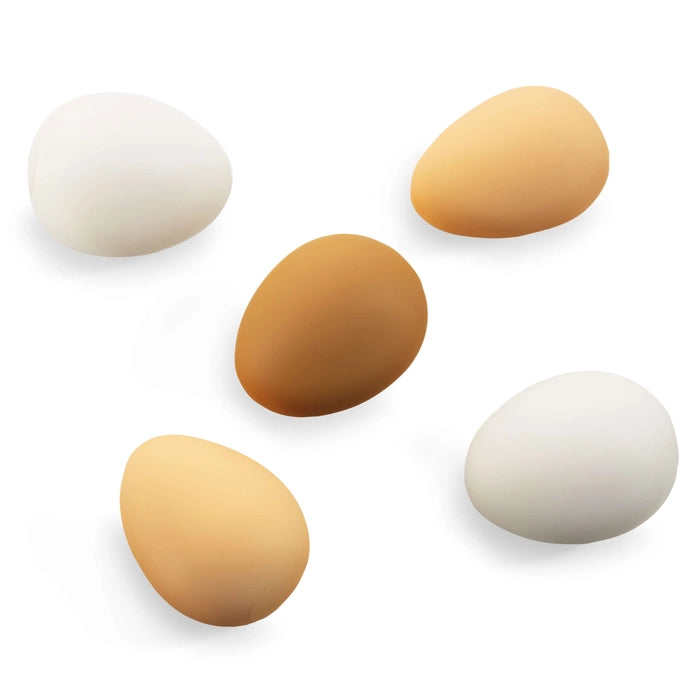Five eggs in various colors on a white background