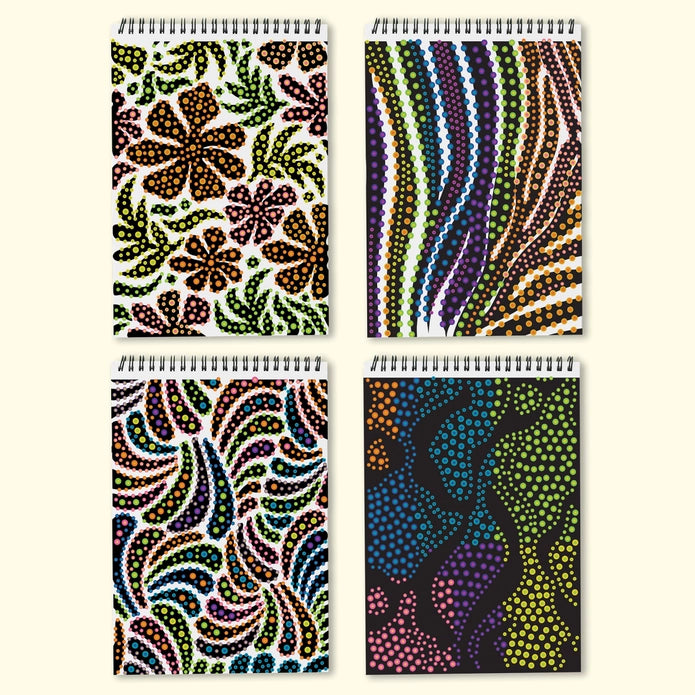 Four spiral-bound notebooks with colorful abstract patterns on a white background