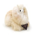 A fluffy faux-fur alpaca plush toy in cream with a small black face and a dark triangular hangtag, photographed on a clean white background.