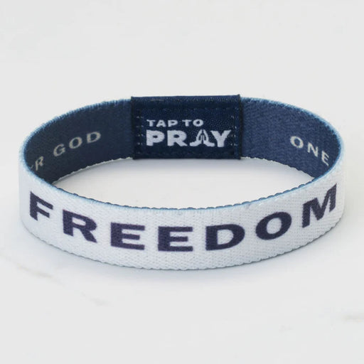 Wristband with 'Tap to Pray' text on a white background