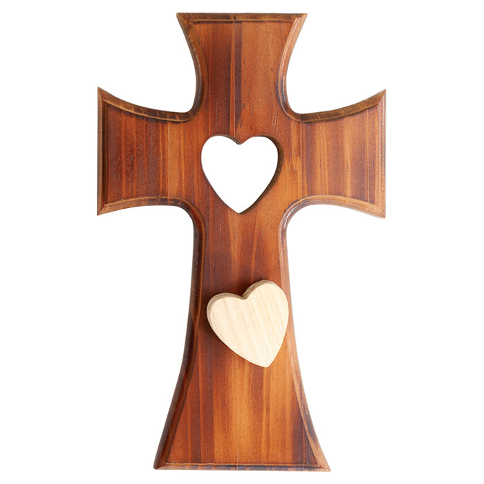 Wooden cross with a heart cutout on a white background