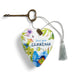 Heart-shaped keychain with floral design and 'Love you Grandma' text on a white background