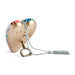A heart-shaped metal wind instrument case with a gold-toned finish, multicolor patterned edges, a white braided hanging cord, metal ring, and tassel, shown on a white background.