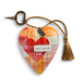 Heart-shaped decorative item with plaid pattern, tassel, and 'p.s. I love you' tag on a white background