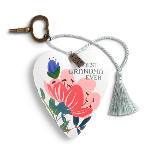 Heart-shaped keepsake plaque with a floral design and the text 'BEST GRANDMA EVER', attached to a rope with a tassel and a brass key ring, on a white background.
