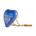 A heart-shaped wooden hanging ornament in blue with printed text reading 'FAMILY WHERE LOVE BEGINS AS CHAOS NEVER ENDS' in white and orange, with a gold tassel and rope on a white background.