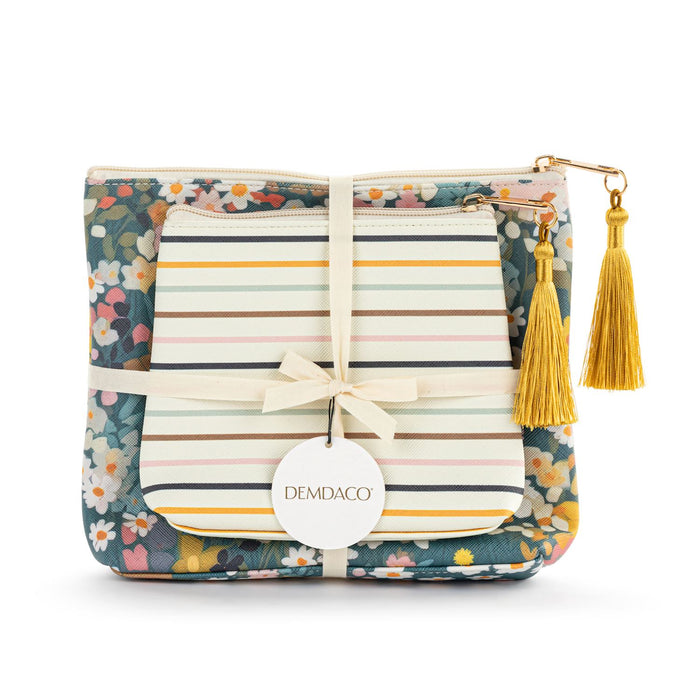 Floral and striped pouch with tassels and Demdaco tag on a white background