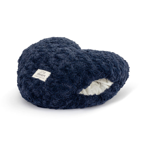 Pair of navy blue fuzzy slippers on a white background