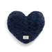 Navy heart-shaped pillow with a label on a white background