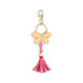 Gold keychain with pink tassel and beads on a white background