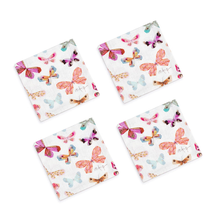 Four colorful butterfly-patterned coasters on a white background