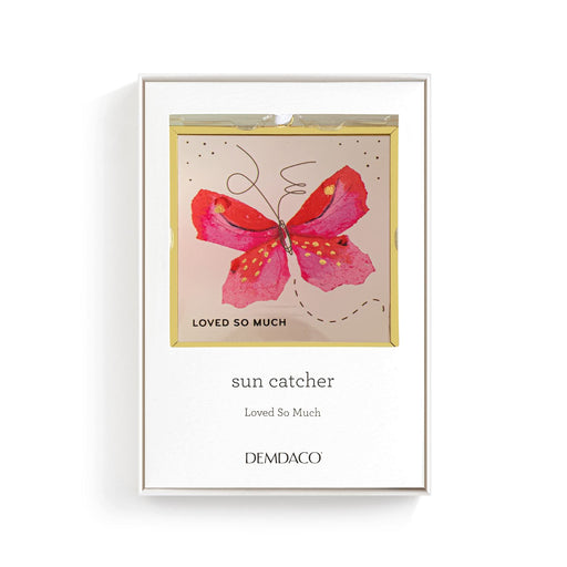 Framed artwork with a pink butterfly design and text on a white background