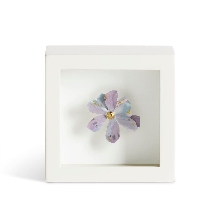 Decorative flower in a white frame on a white background