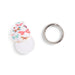 Floral-patterned keychain and silver ring on a white background