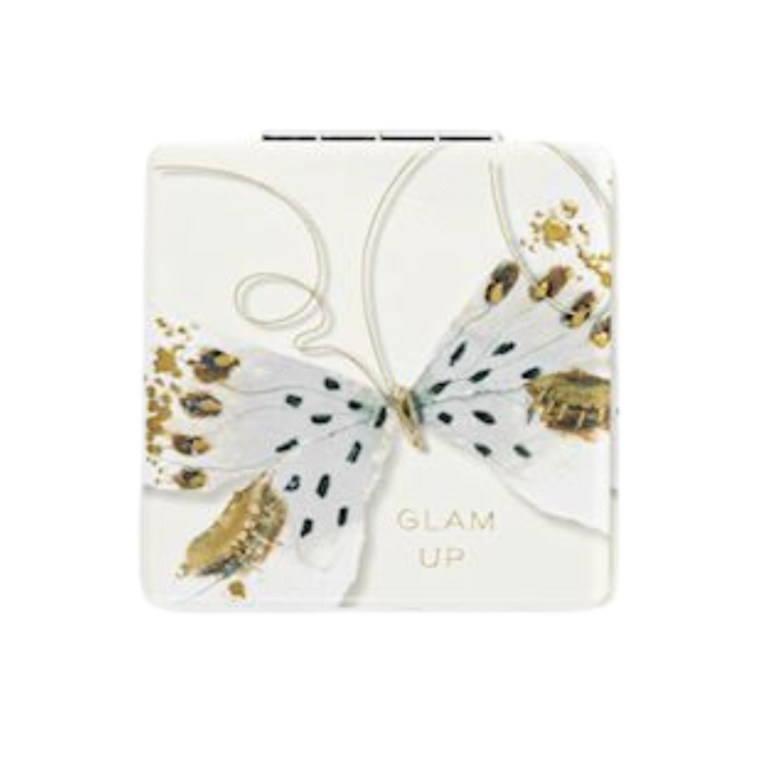 Butterfly-shaped compact mirror with gold and black accents on a white background