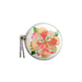 Round mirror with floral design on a white background
