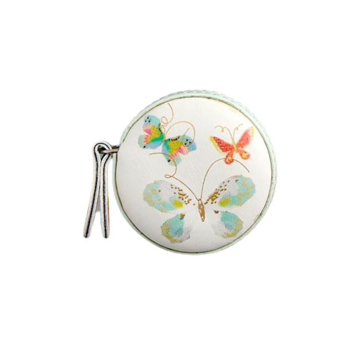 Round mirror with butterfly design on a white background