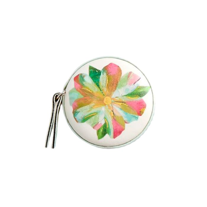 Round mirror with floral design on a white background
