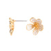 Gold and white floral earrings on a white background