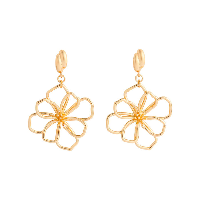 Gold flower-shaped earrings on a white background