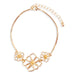 Gold floral bracelet on a white background