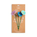 Packaged flower-shaped pins with 'Demdaco Faith' branding on a white background