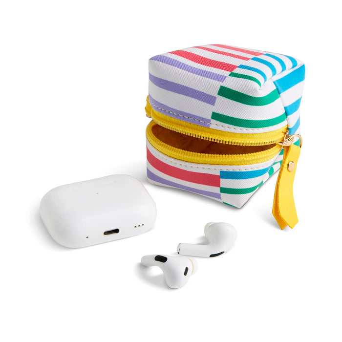 Colorful striped case with white wireless earbuds on a white background