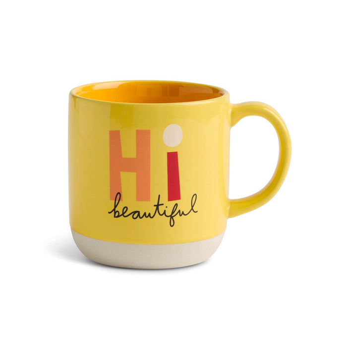 Yellow mug with 'Hi beautiful' text on a white background