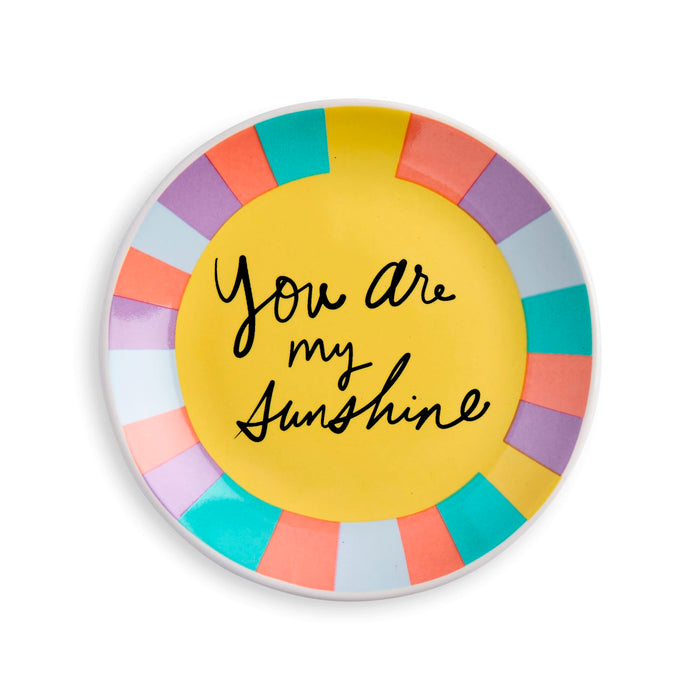 Round colorful coaster with 'You are my sunshine' text on a white background