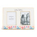 Decorative photo frame with floral design and text on a white background