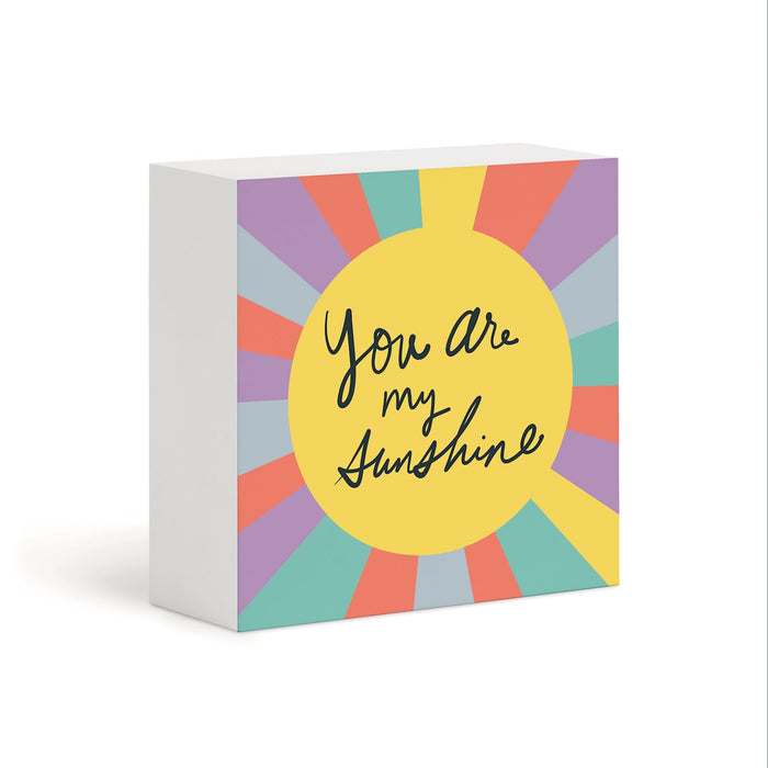 A square white block sign with a colorful sunburst design and the phrase 'You are my Sunshine' in black script, shown on a clean white background.