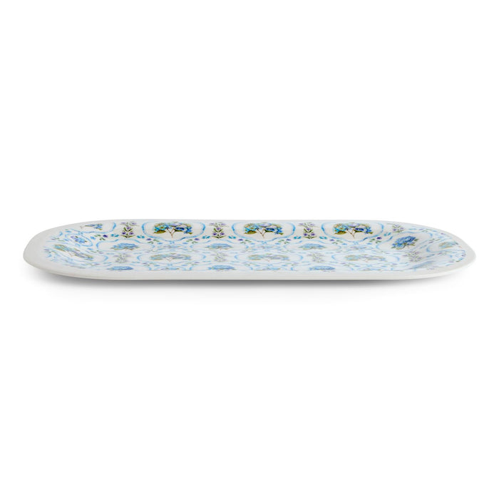 Decorative oval plate with floral patterns on a white background