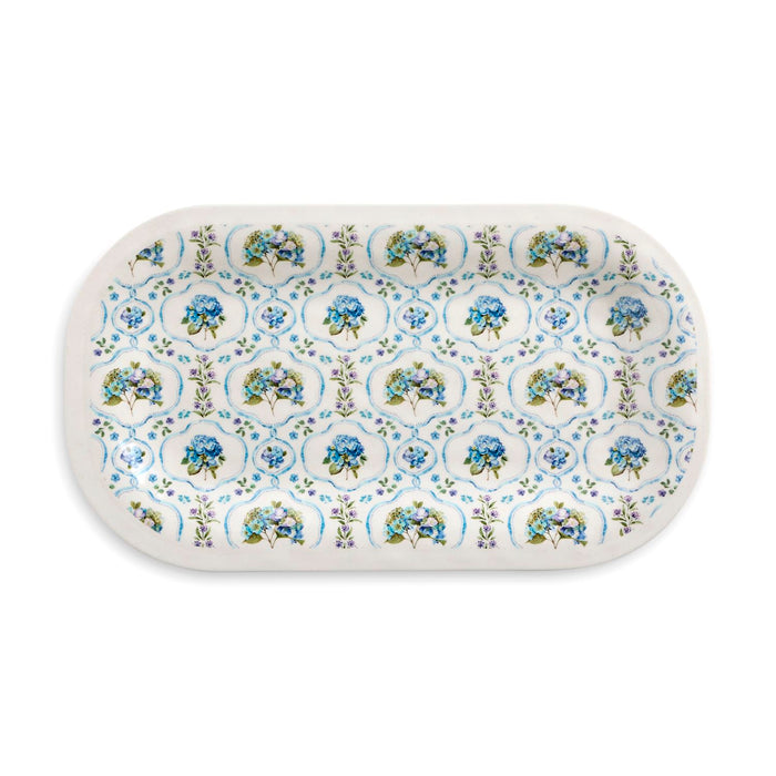 Rectangular ceramic tray with floral pattern on a white background