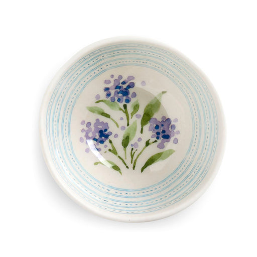 Ceramic bowl with floral design on a white background
