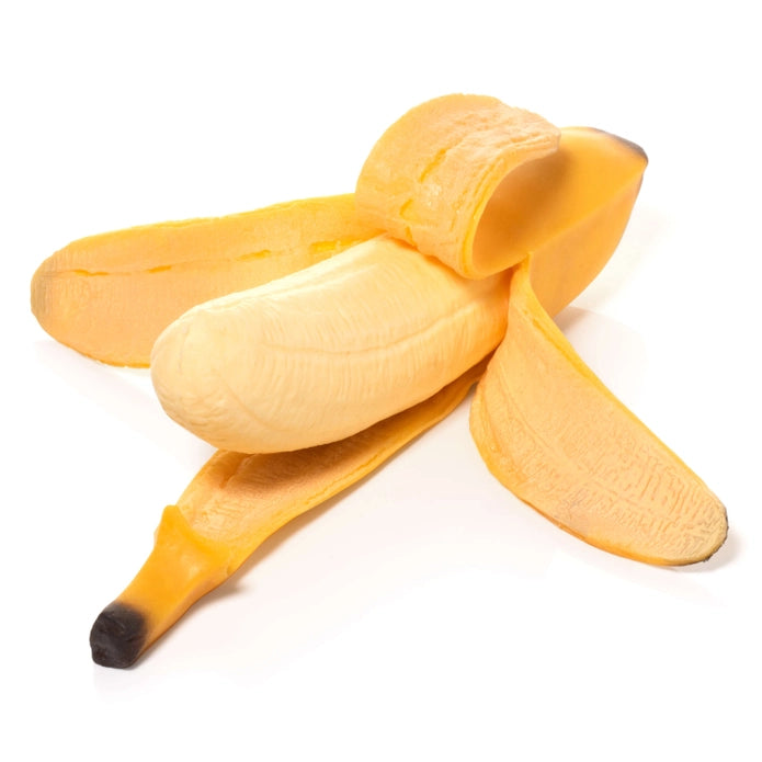 Yellow banana peel on a white background