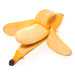 Yellow banana peel on a white background