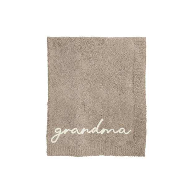 Textile product with 'grandma' printed on it, on a white background