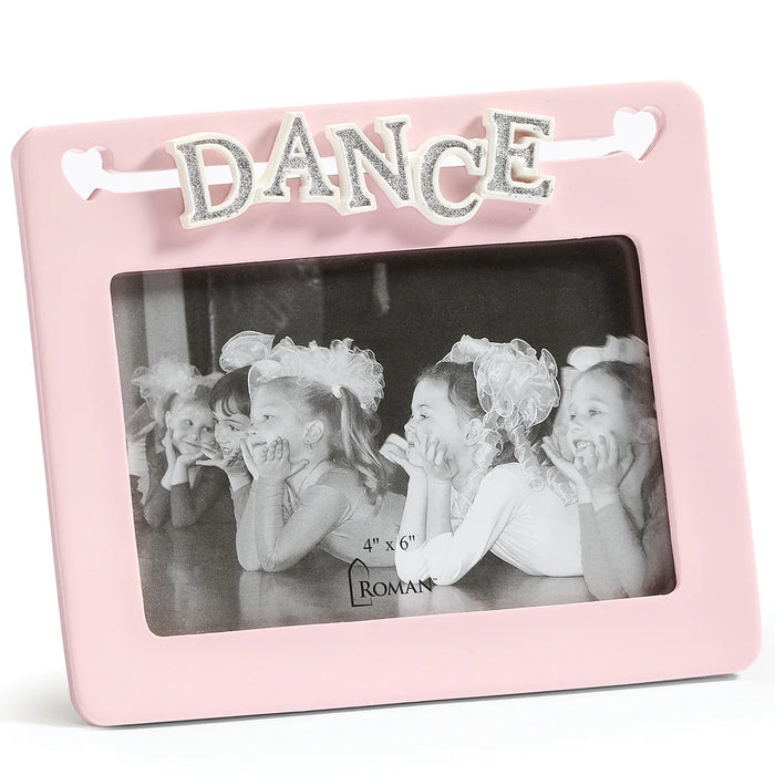 Pink photo frame with 'DANCE' text and black and white photo of children, on a white background