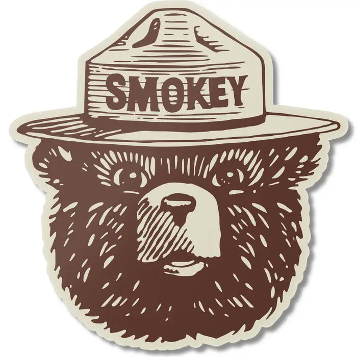 Sticker of a bear wearing a hat with 'Smokey' text on a white background