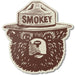 Sticker of a bear wearing a hat with 'Smokey' text on a white background
