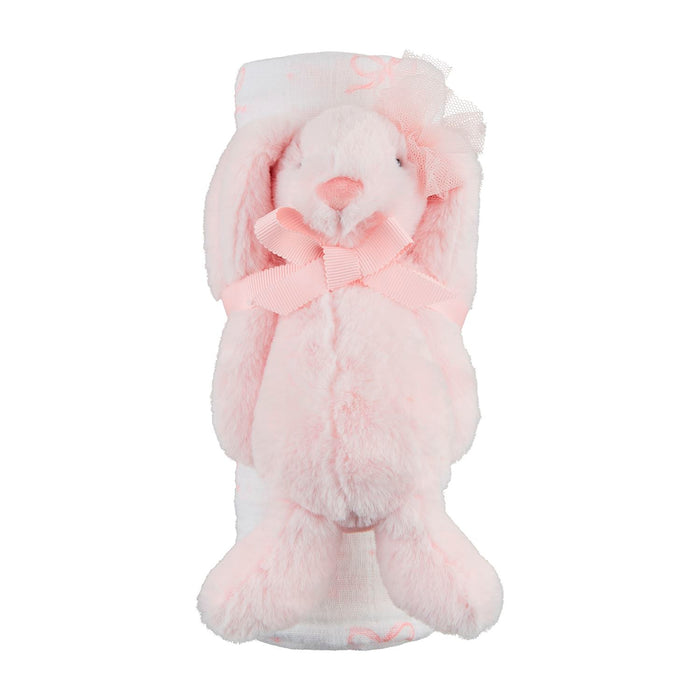 Pink plush toy with a bow on a white background