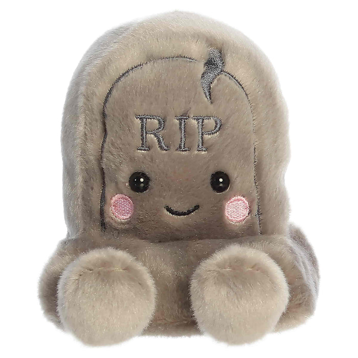 Plush toy resembling a cartoonish tombstone with 'RIP' on a white background