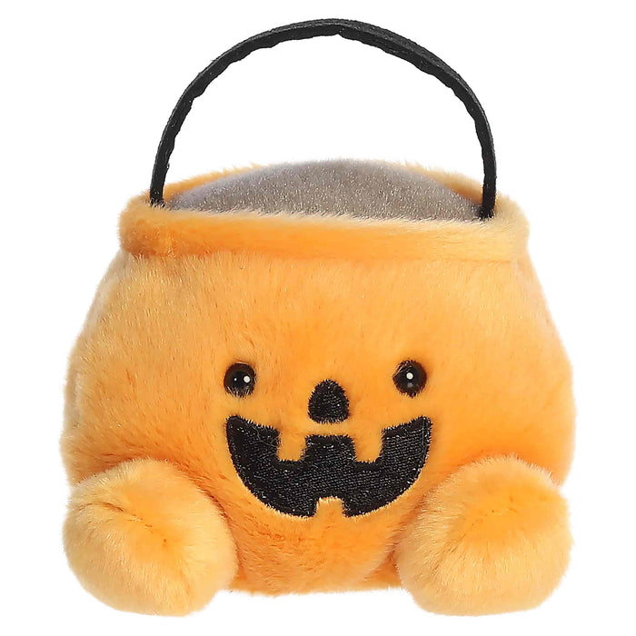 Plush Halloween candy bucket with a smiling face on a white background